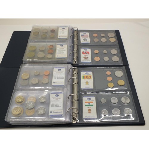 83 - 2x ALBUMS OF THE MONEY OF THE WORLD COINS WITH CERTIFICATES OF AUTHENTICITY