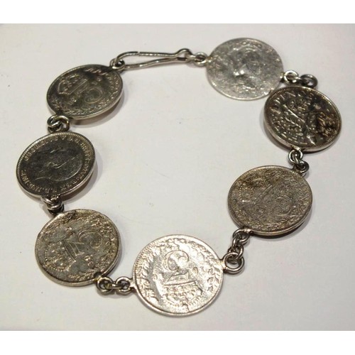 205 - SILVER COIN BRACELETS INCLUDING THREE SILVER PRE 1947 AND TWO COIN PENDANTS