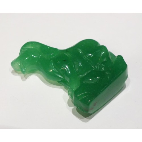 209 - THREE CARVED JADE PIECES AND CARVED JADE DOG