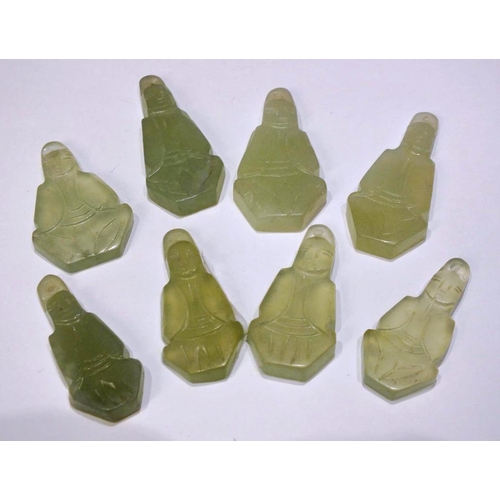 210 - SET OF EIGHT CARVED JADE BUDDHA PENDANTS