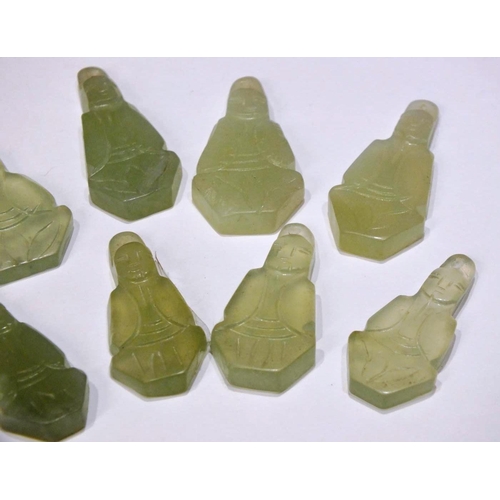 210 - SET OF EIGHT CARVED JADE BUDDHA PENDANTS