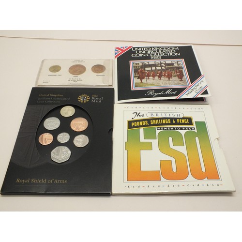 10 - FOUR COIN SETS