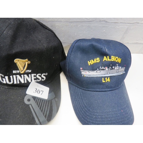 307 - TRAY OF GUINNESS HATS AND GUINNESS BADGES