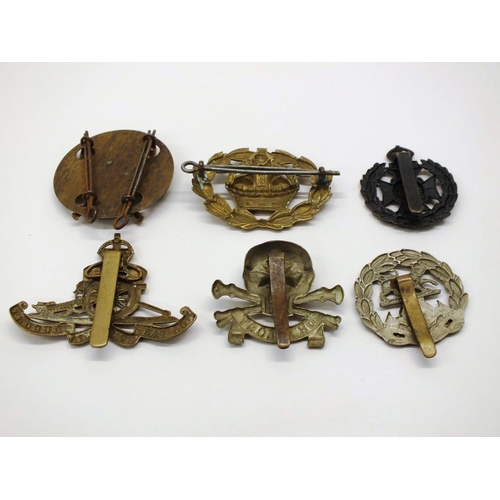 26 - SIX MILITARY CAP BADGES