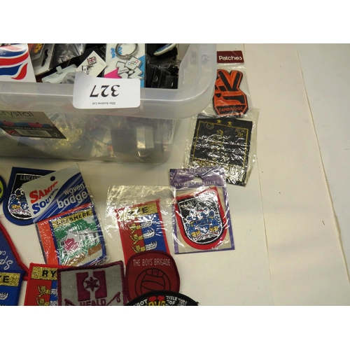 327 - TUB OF BADGES AND PATCHES BUTLINS, MUSIC PATCHES, KEY RINGS