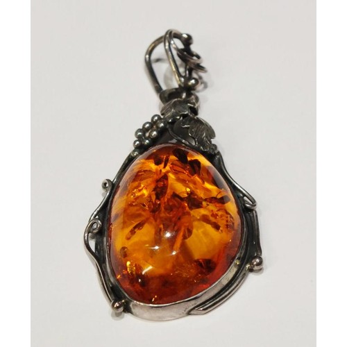 276 - TWO AMBER AND SILVER PENDANTS AND AMBER AND SILVER EARRINGS