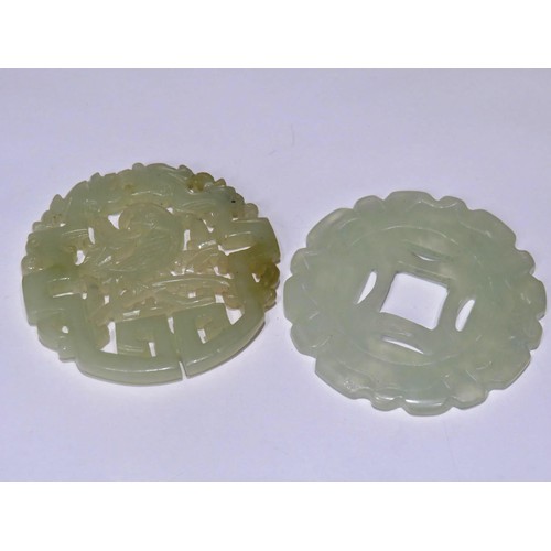 212 - TWO CARVED WHITE JADE PENDANTS