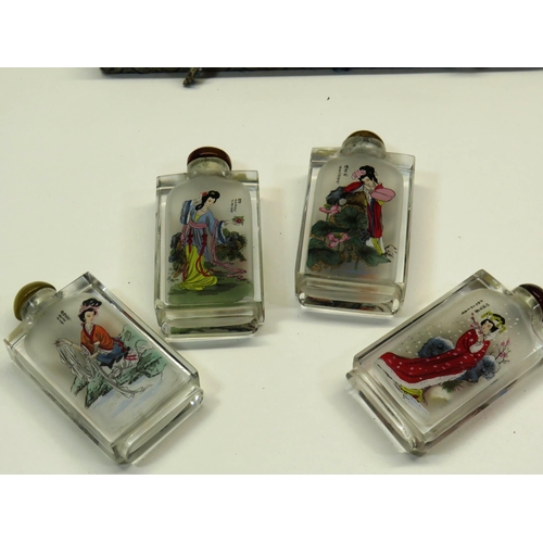 61 - BOXED SET OF FOUR ORIENTAL INSIDE PAINTED SNUFF BOTTLES- 