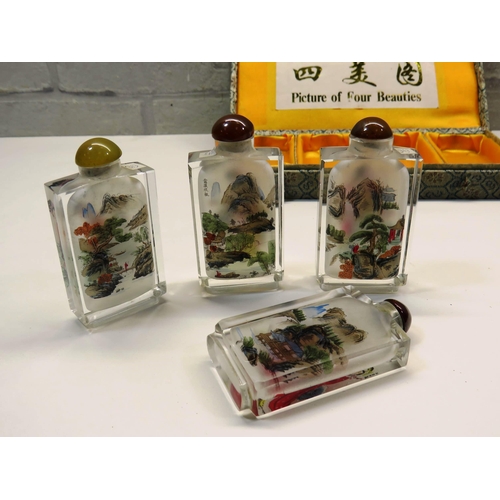 61 - BOXED SET OF FOUR ORIENTAL INSIDE PAINTED SNUFF BOTTLES- 