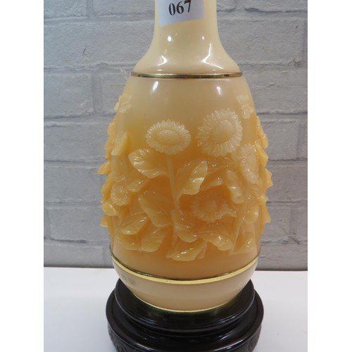 67 - LARGE CHINESE CARVED RESIN VASE AND STAND APPROXIMATE HEIGHT 16.5