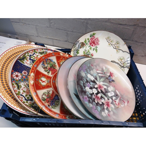 69 - TWO TRAYS OF ORIENTAL CERAMICS- PLATES, FAMILLE ROSE PICTURE FRAME AND BUDDHA PRINT