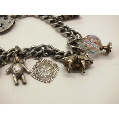 241 - VINTAGE SILVER CHARM BRACELET 39g