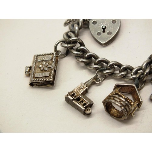 241 - VINTAGE SILVER CHARM BRACELET 39g