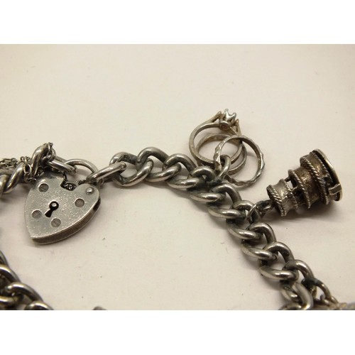 241 - VINTAGE SILVER CHARM BRACELET 39g