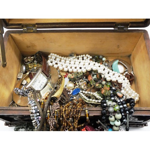 257 - HAND CARVED ANTIQUE JEWELLERY BOX FULL OF VINTAGE JEWELLERY