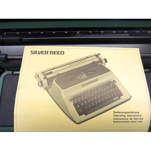 379 - SILVER REED TYPEWRITER WITH INSTRUCTION MANUAL