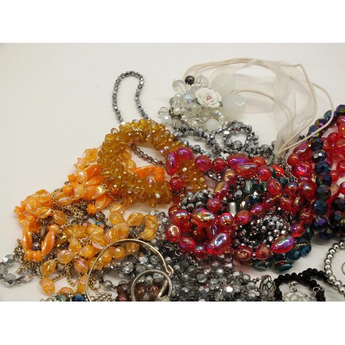 335 - BAG FULL OF COSTUME JEWELLRY INCLUDING GLASS, FOIL NECKLACES, BRACELETS ETC