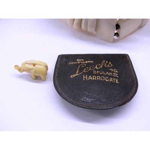 100 - CHINESE CARVED DIORAMA IN PLINTH, BONE BANGLE, BONE PENDANT AND ELEPHANT TRINKET IN VINTAGE LATHER J... 