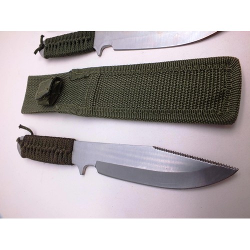 57 - SET OF THREE THROWING STYLE KNIFES IN POLYESTER SHEATHS 7.75'