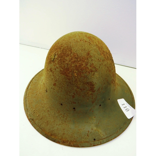 110 - TWO WW2 STEEL HELMETS