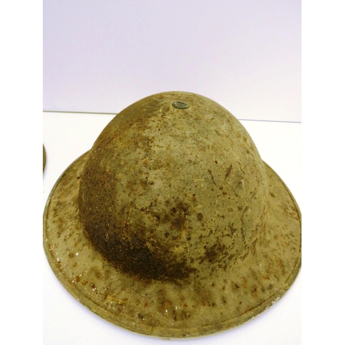 110 - TWO WW2 STEEL HELMETS