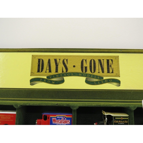 68 - TWO DAYS GONE DISPLAY RACKS AND VEHICLES