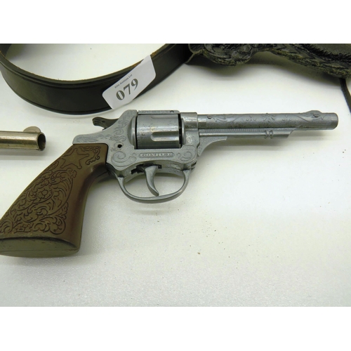 79 - TWO TOY PISTOLS IN LEATHER GUN BELT HOLSTER