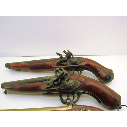 80 - EIGHT ORNAMENTAL FLINTLOCK PISTOLS