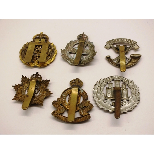 25 - SIX MILITARY CAP BADGES