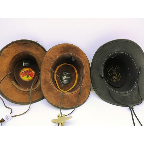 284 - TWO AUSTRALIAN STYLE LEATHER HATS AND RYEDALE AUSTRALIAN LEATHER HAT