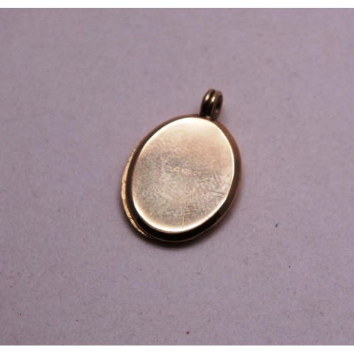 232 - 9ct GOLD LOCKET