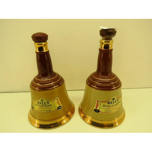 368 - FOUR ASSORTED SIZED WADE BELLS WHISKY DECANTER BOTTLES