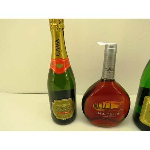 370 - FOUR BOTTLES OF ALCOHOL INCLUDES 1.51 CHARLEMANGNE, VINTAGE CAVA AND MATEUS