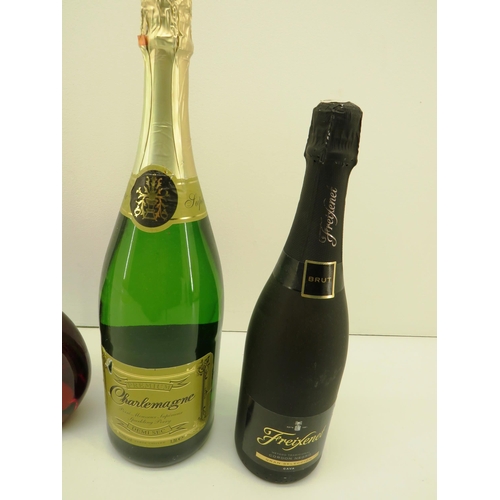 370 - FOUR BOTTLES OF ALCOHOL INCLUDES 1.51 CHARLEMANGNE, VINTAGE CAVA AND MATEUS