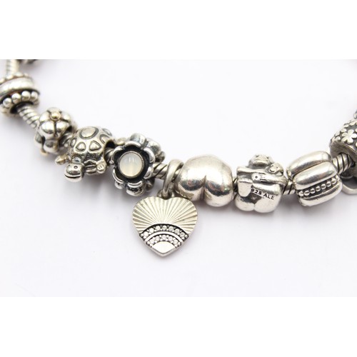 410 - .925 pandora bracelet with charms (60g)