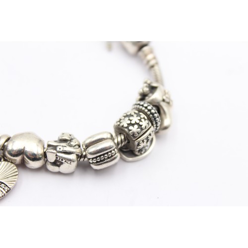 410 - .925 pandora bracelet with charms (60g)