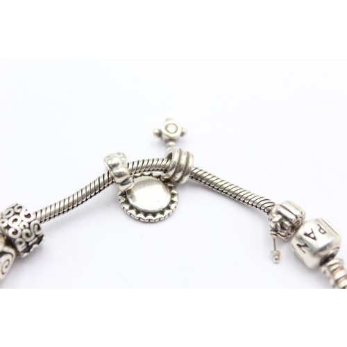 410 - .925 pandora bracelet with charms (60g)