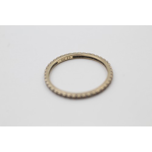 418 - 9ct gold diamond eternity ring (0.7g) SIZE N