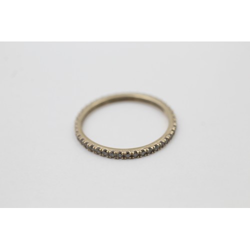 418 - 9ct gold diamond eternity ring (0.7g) SIZE N