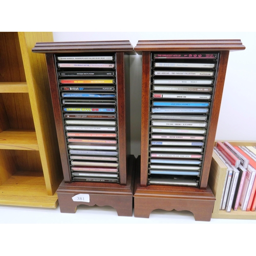 381 - THREE WOODEN CD TOWERS AND JOBLOT OF CDS