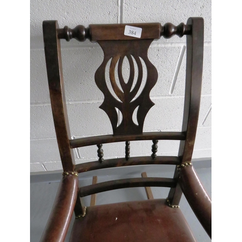 384 - ANTIQUE MAHOGANY AND BROWN LEATHER STUDDED ROCKING CHAIR