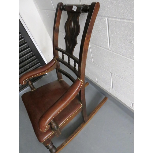 384 - ANTIQUE MAHOGANY AND BROWN LEATHER STUDDED ROCKING CHAIR