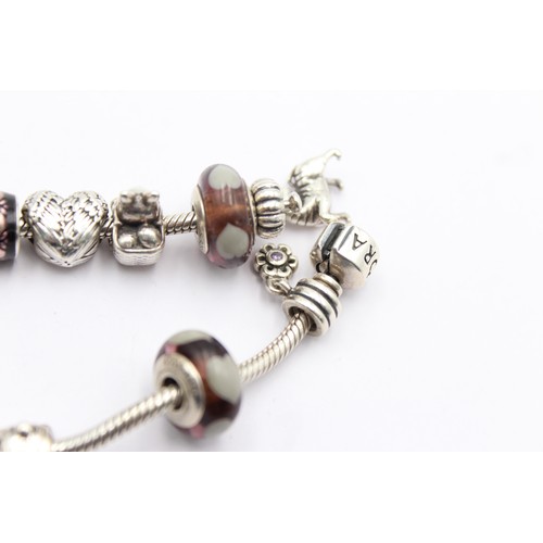 446 - 925 pandora bracelet with charms (60g)