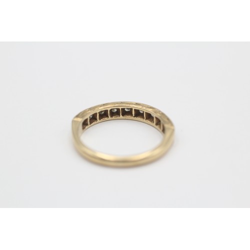 451 - 9ct gold diamond half eternity ring (2.3g) SIZE L