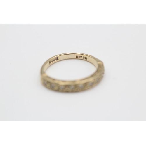 451 - 9ct gold diamond half eternity ring (2.3g) SIZE L