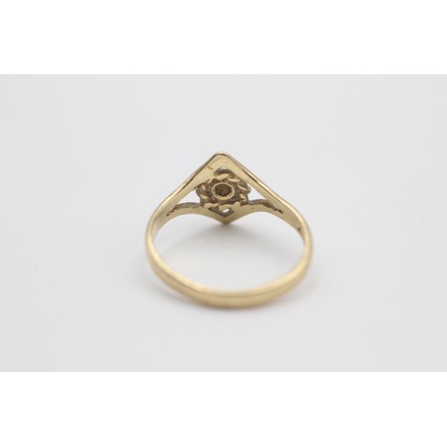 455 - 9ct gold amethyst solitaire ring with openwork detail (1.1g) SIZE E