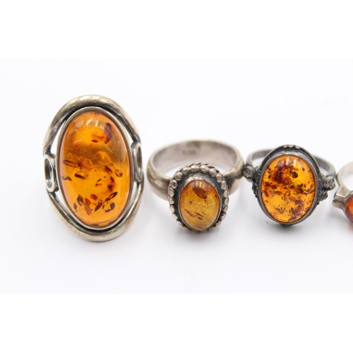 498 - 6 x .925 amber set rings (38g)