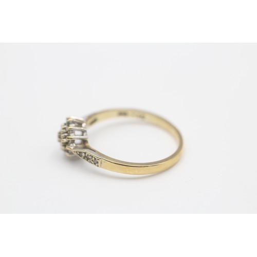 507 - 9ct gold diamond halo ring (1.8g) SIZE O