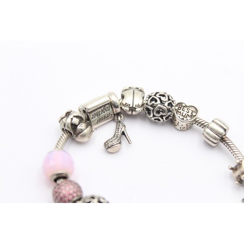 554 - .925 pandora bracelet with charms (54g)