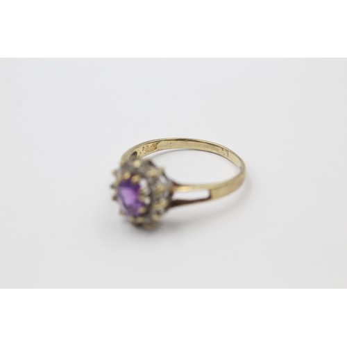 563 - 9ct gold amethyst & clear gemstone halo ring (2.8g) SIZE R